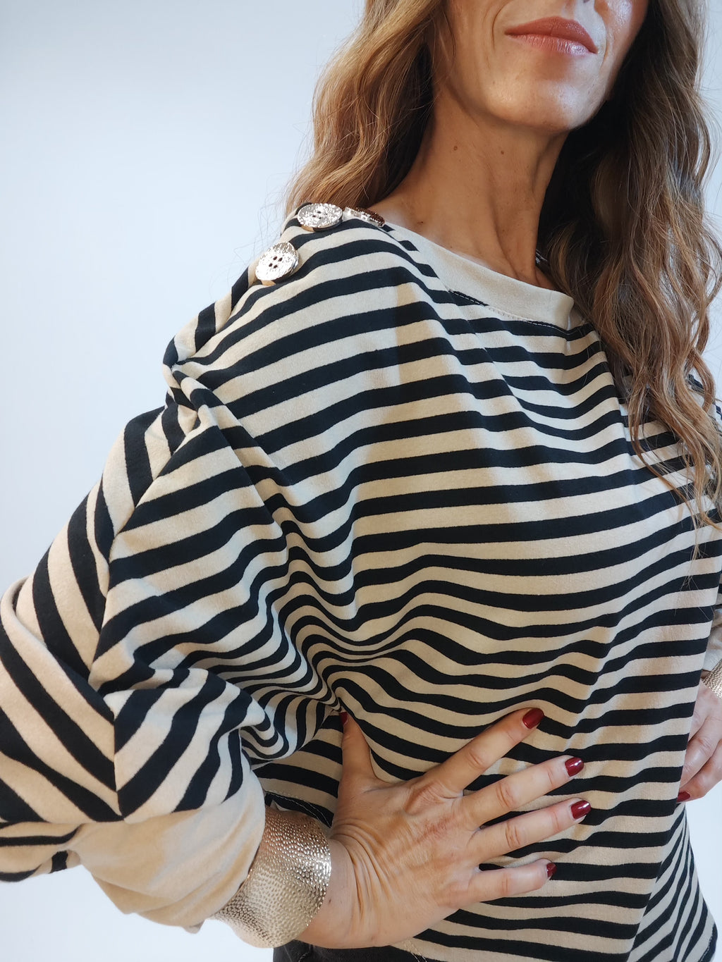 Maglia a righe con maniche a pipistrello